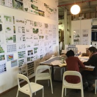 Designers at the conference table, Future Green Studio, Brooklyn, New York, 2016
